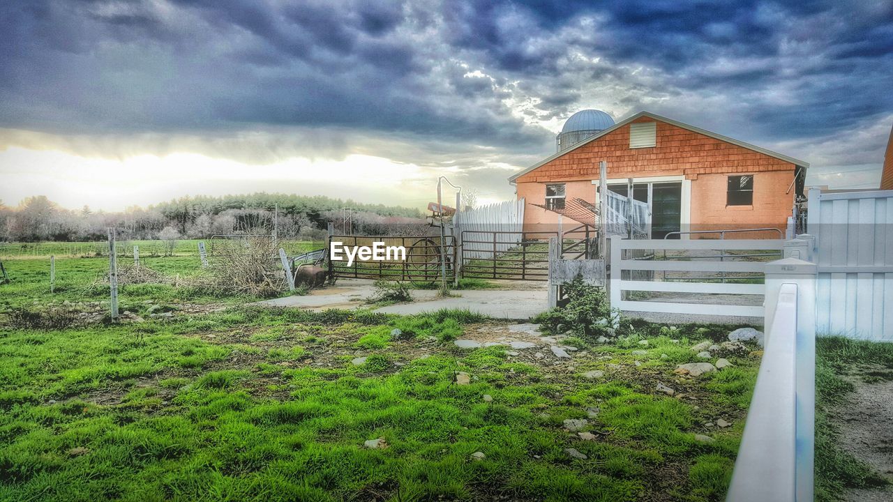 Exterior of house against cloudy sky