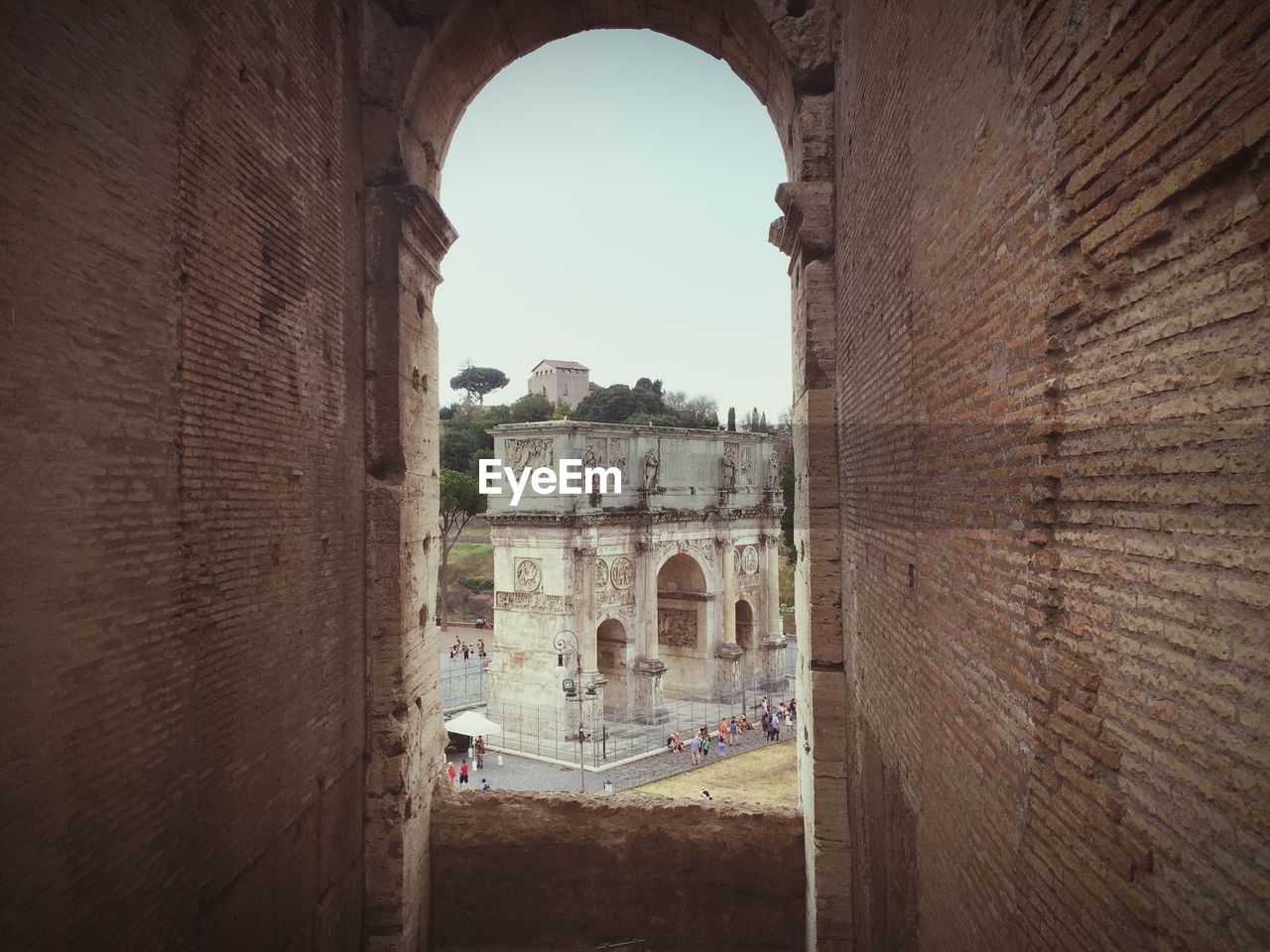 BUILDINGS SEEN THROUGH ARCH