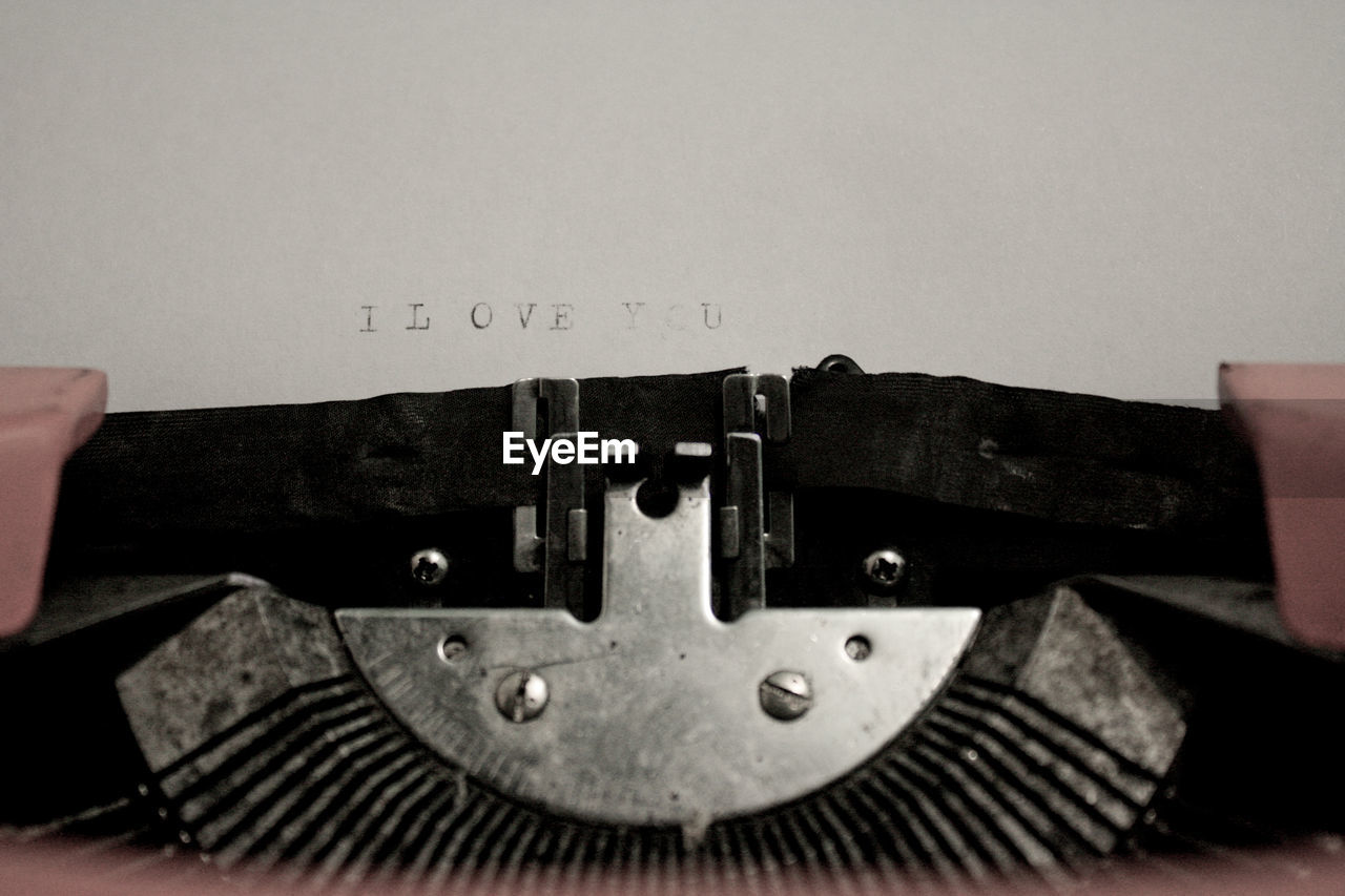 I love you text on paper printed through typewriter