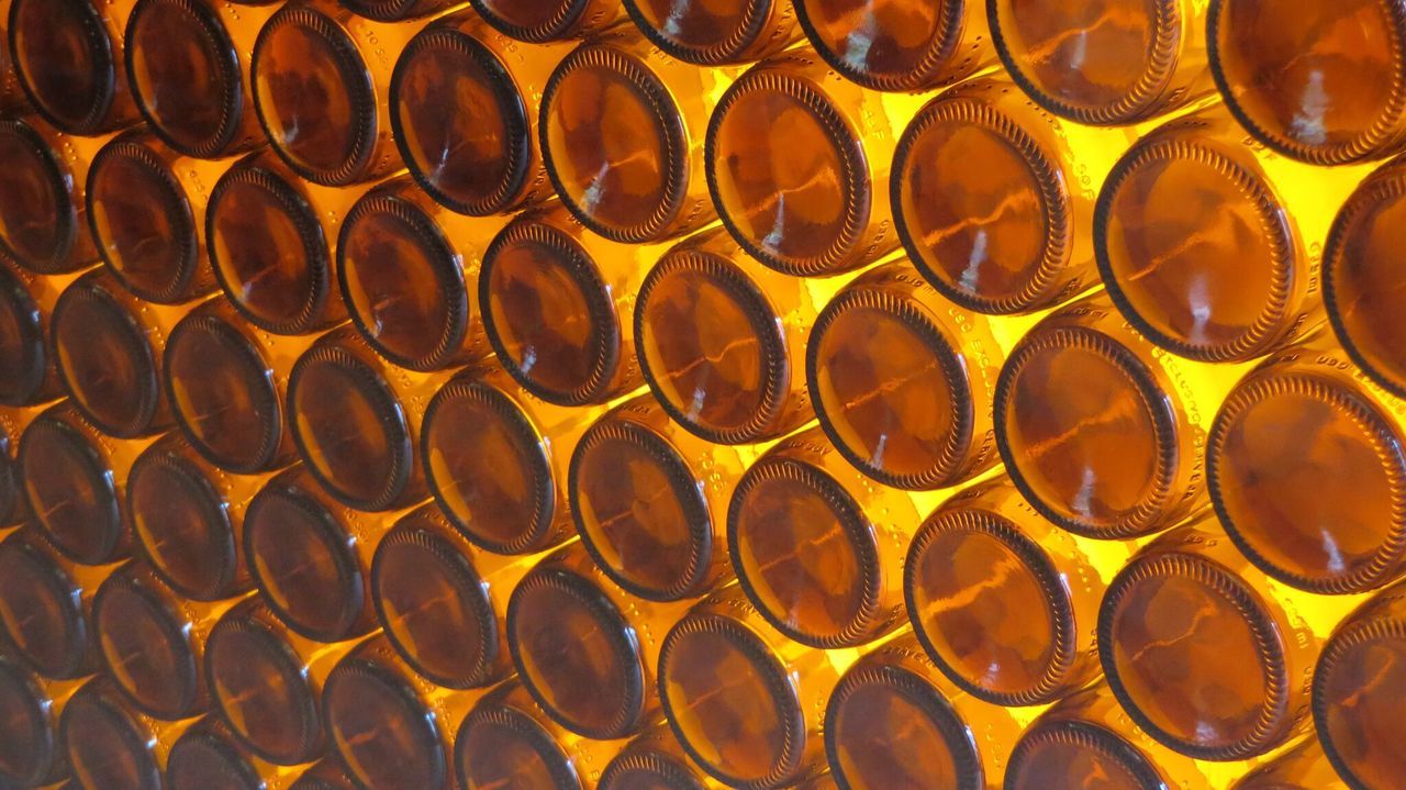 Full frame shot of beer bottles