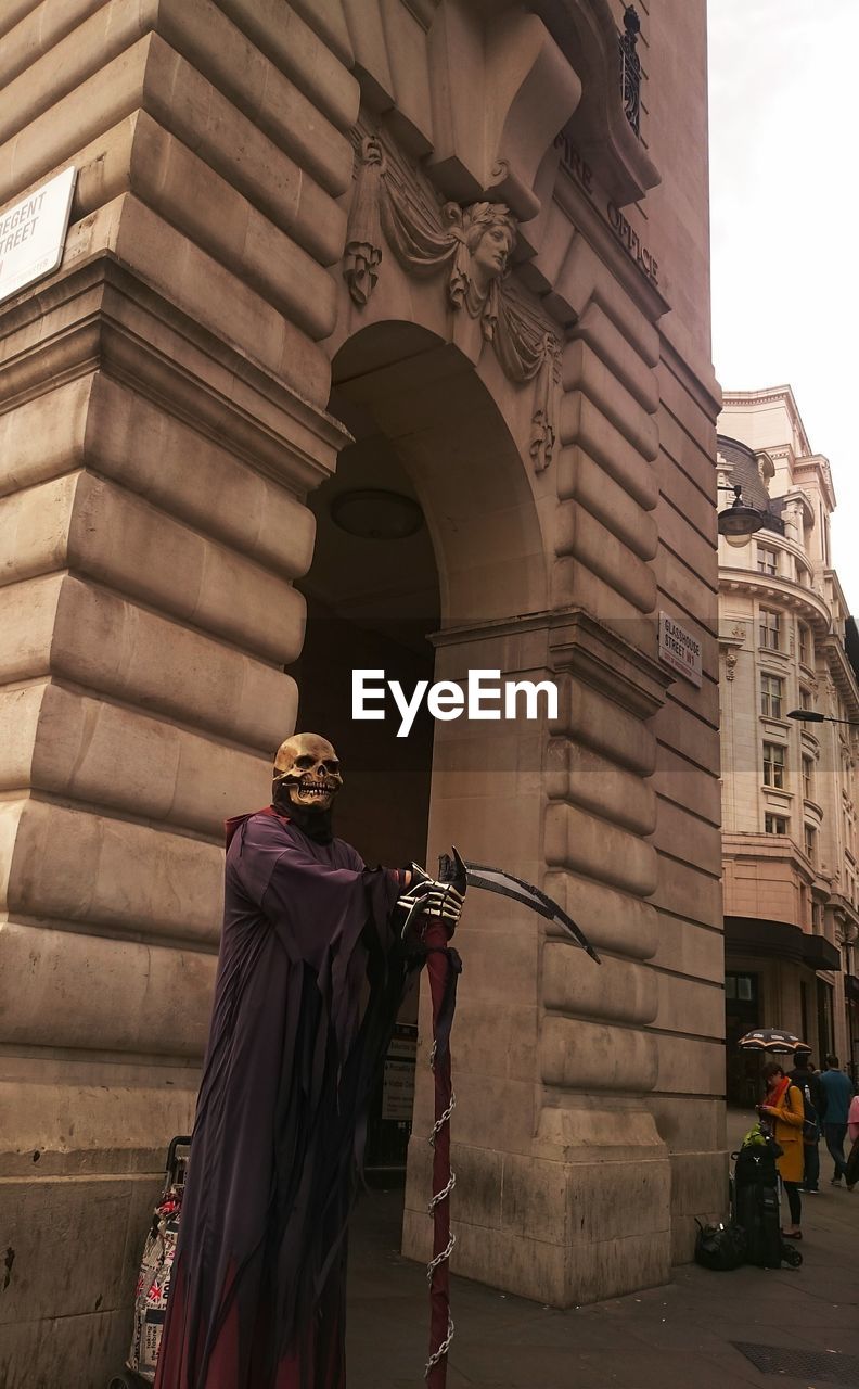 LOW ANGLE VIEW OF A STATUE OF A CHURCH