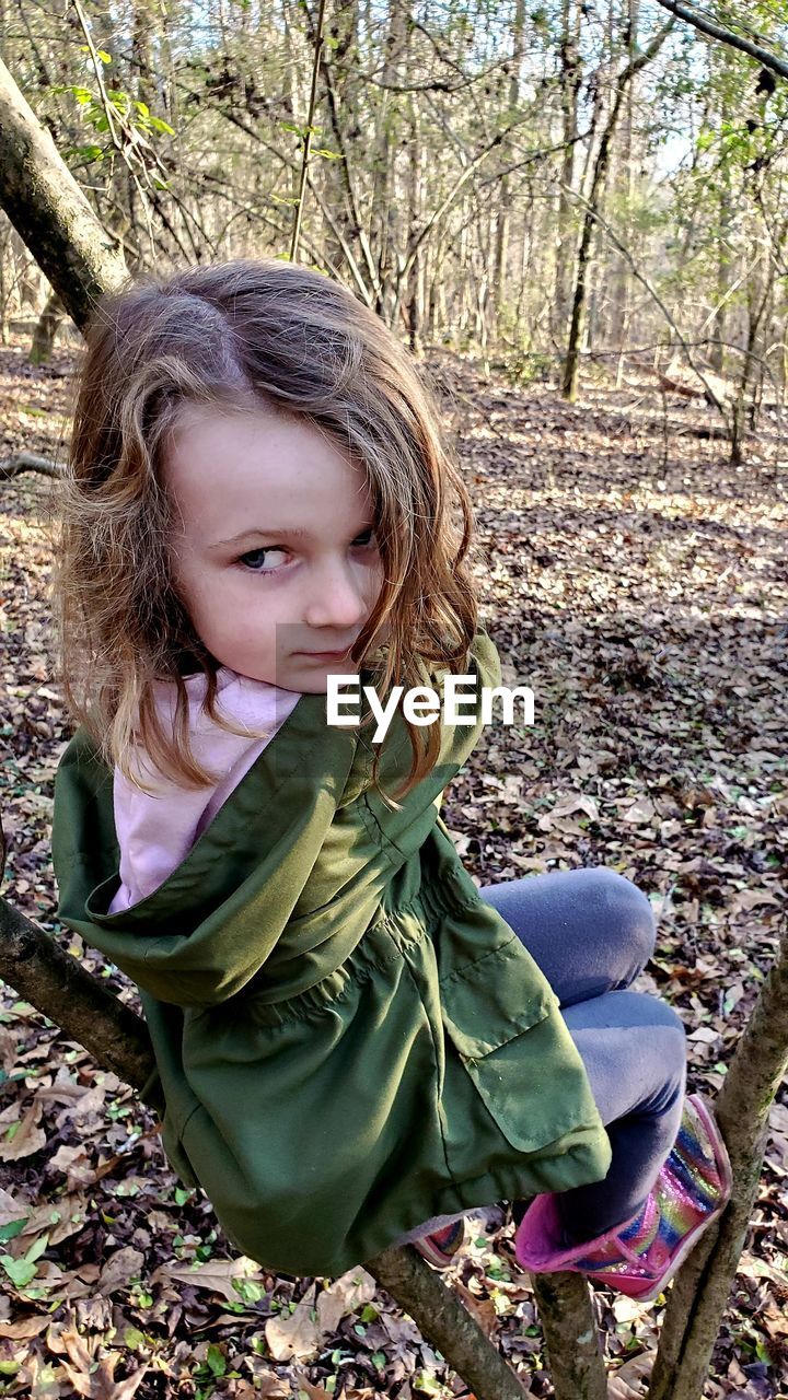 PORTRAIT OF A GIRL IN FOREST