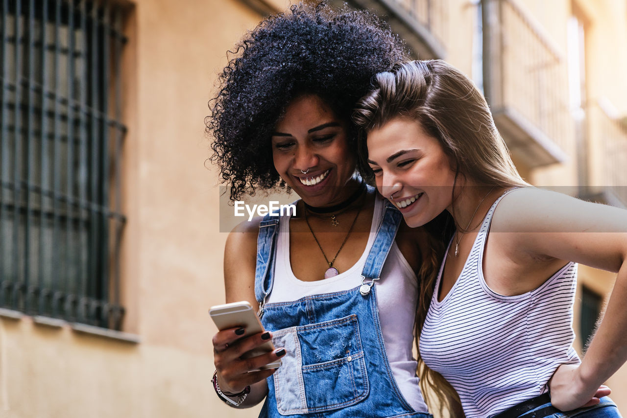 Female friends in city