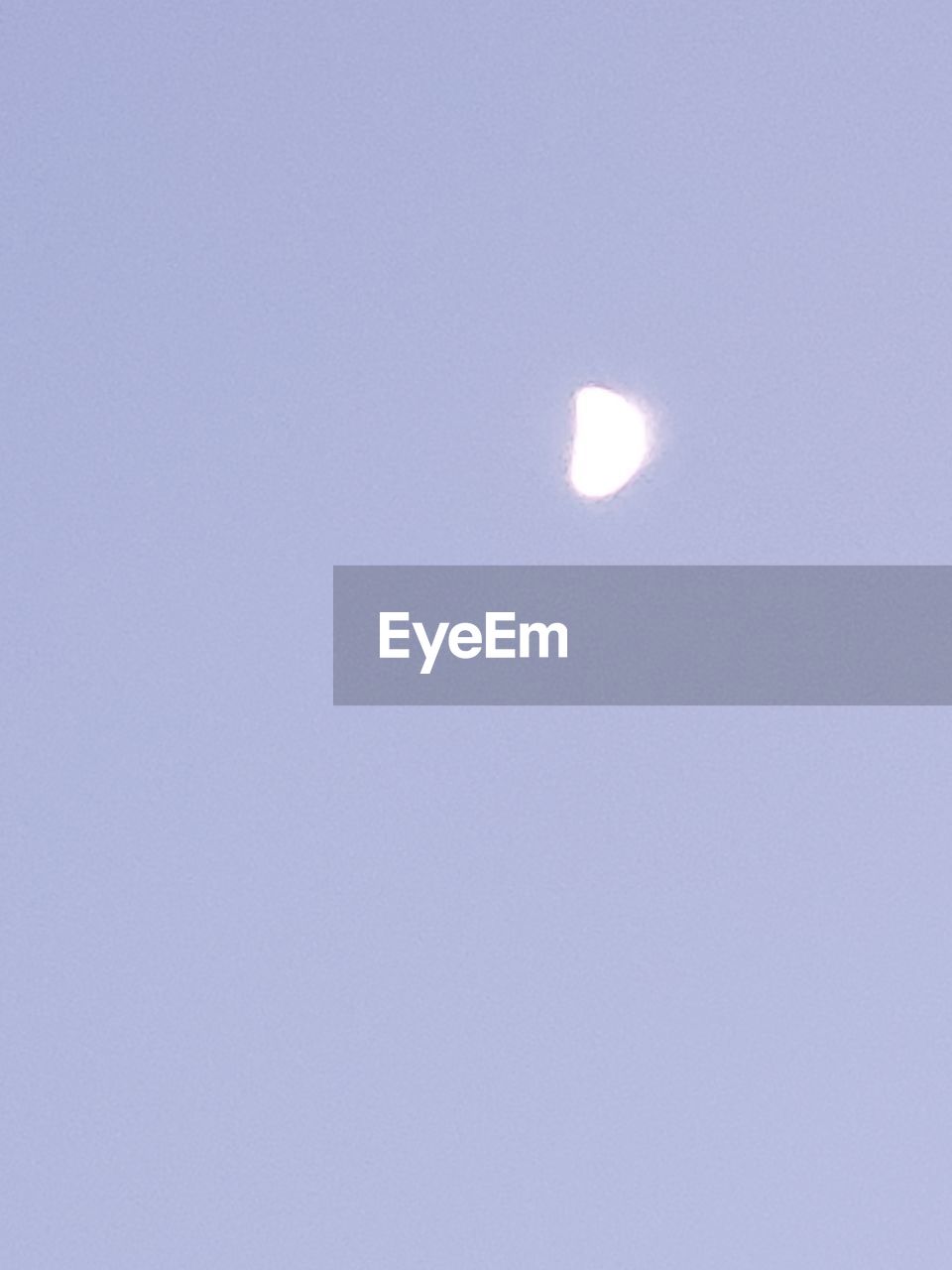 LOW ANGLE VIEW OF MOON AGAINST SKY