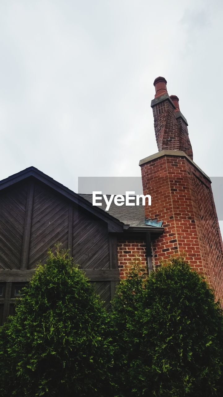 LOW ANGLE VIEW OF BELL TOWER AGAINST SKY