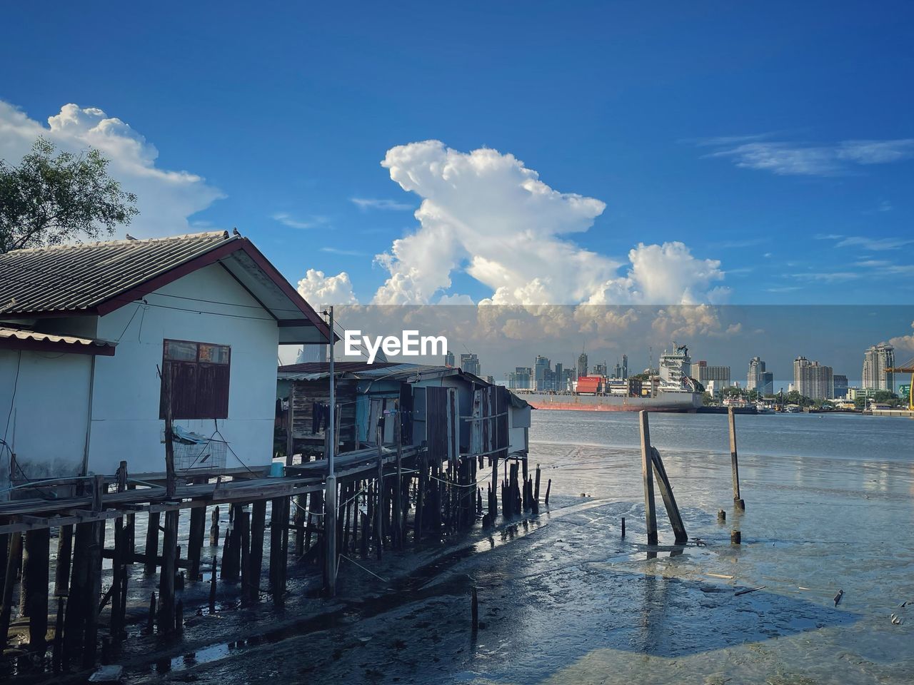 Small house by the water in daylight