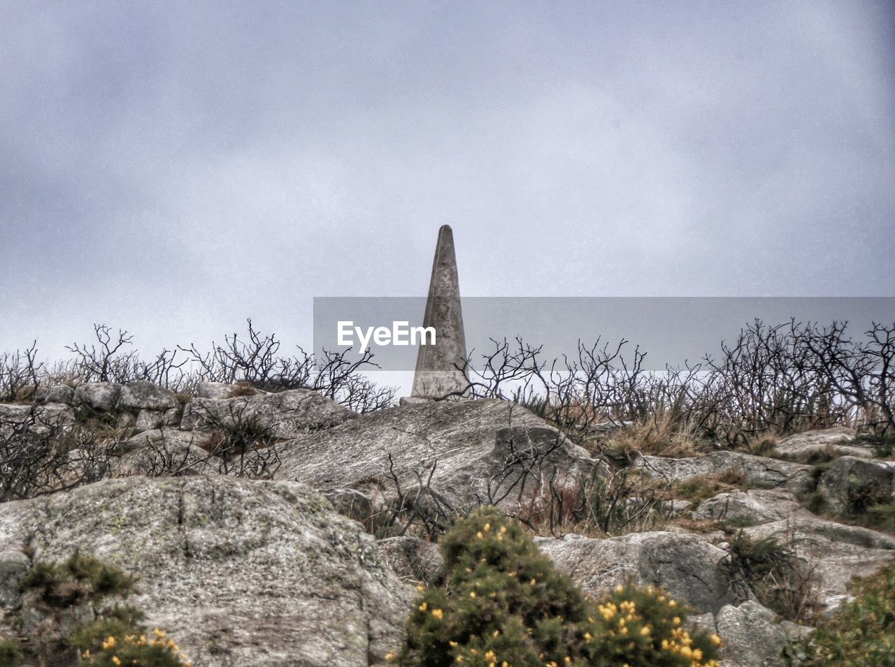 Low angle view of obelisk at killiney hill against sky