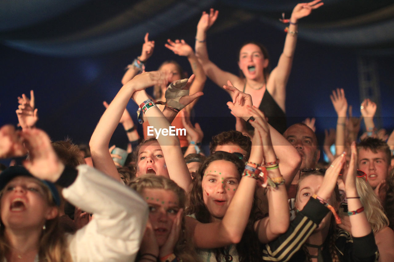 YOUNG COUPLE AT MUSIC CONCERT