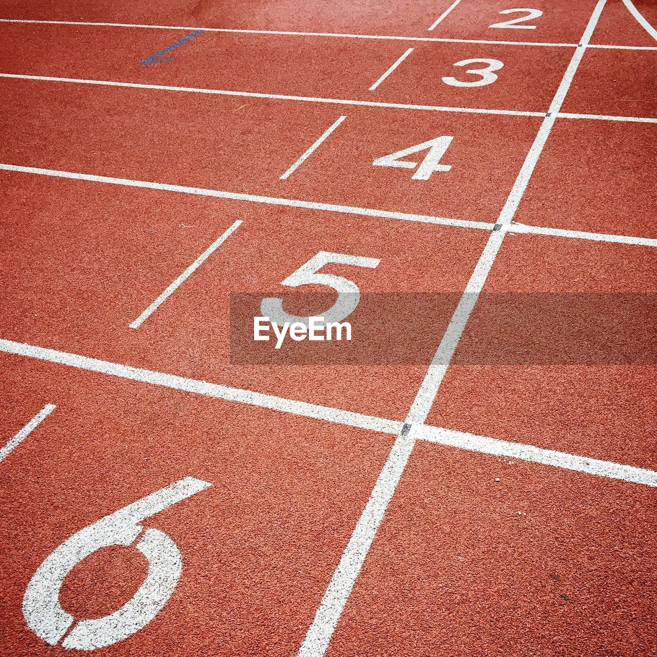 Close-up of numbers on running track
