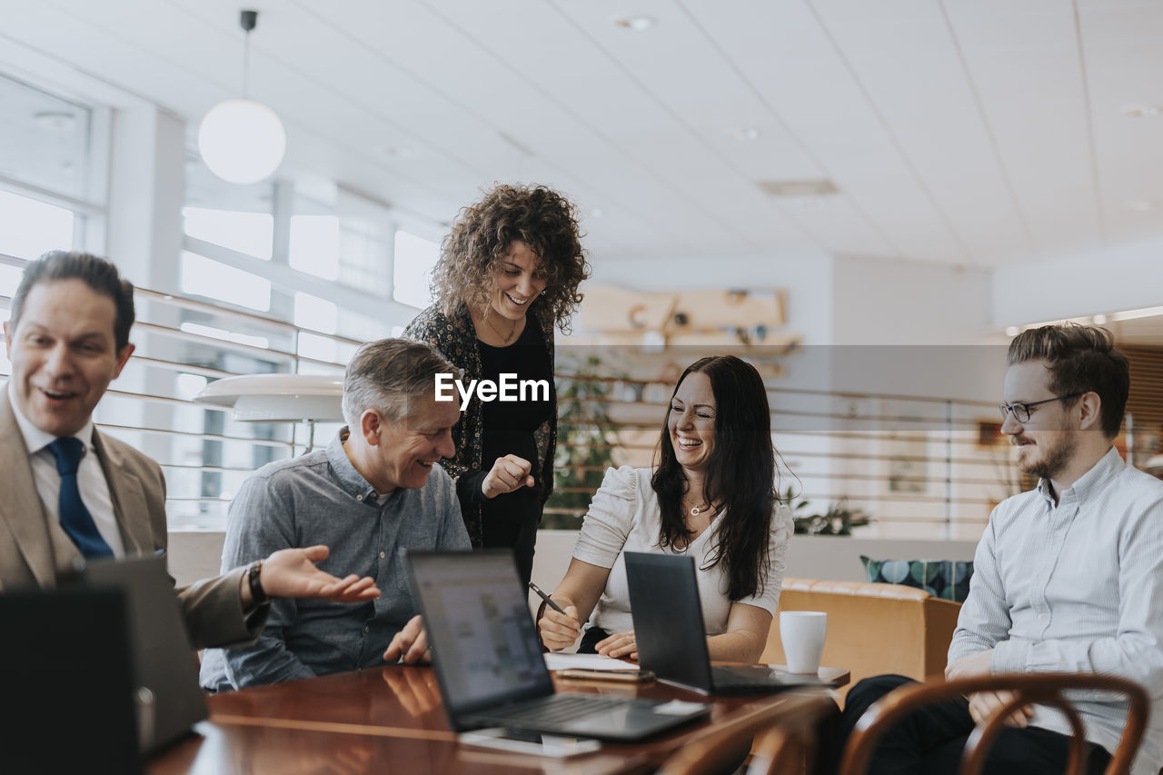 People talking during business meeting