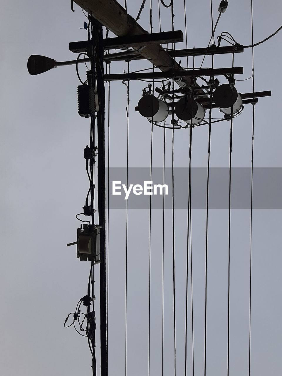 LOW ANGLE VIEW OF SILHOUETTE POLE AGAINST CLEAR SKY