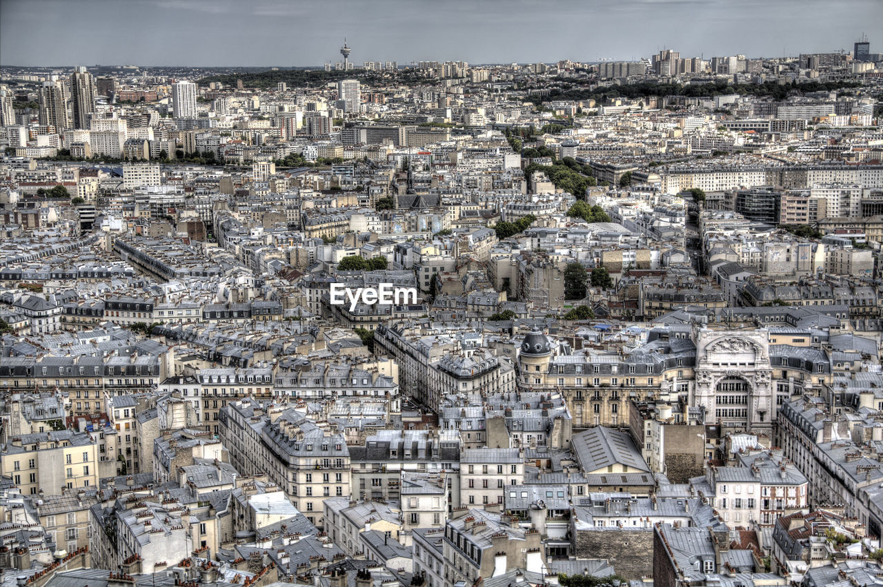 High angle view of cityscape seen through eiffel tower