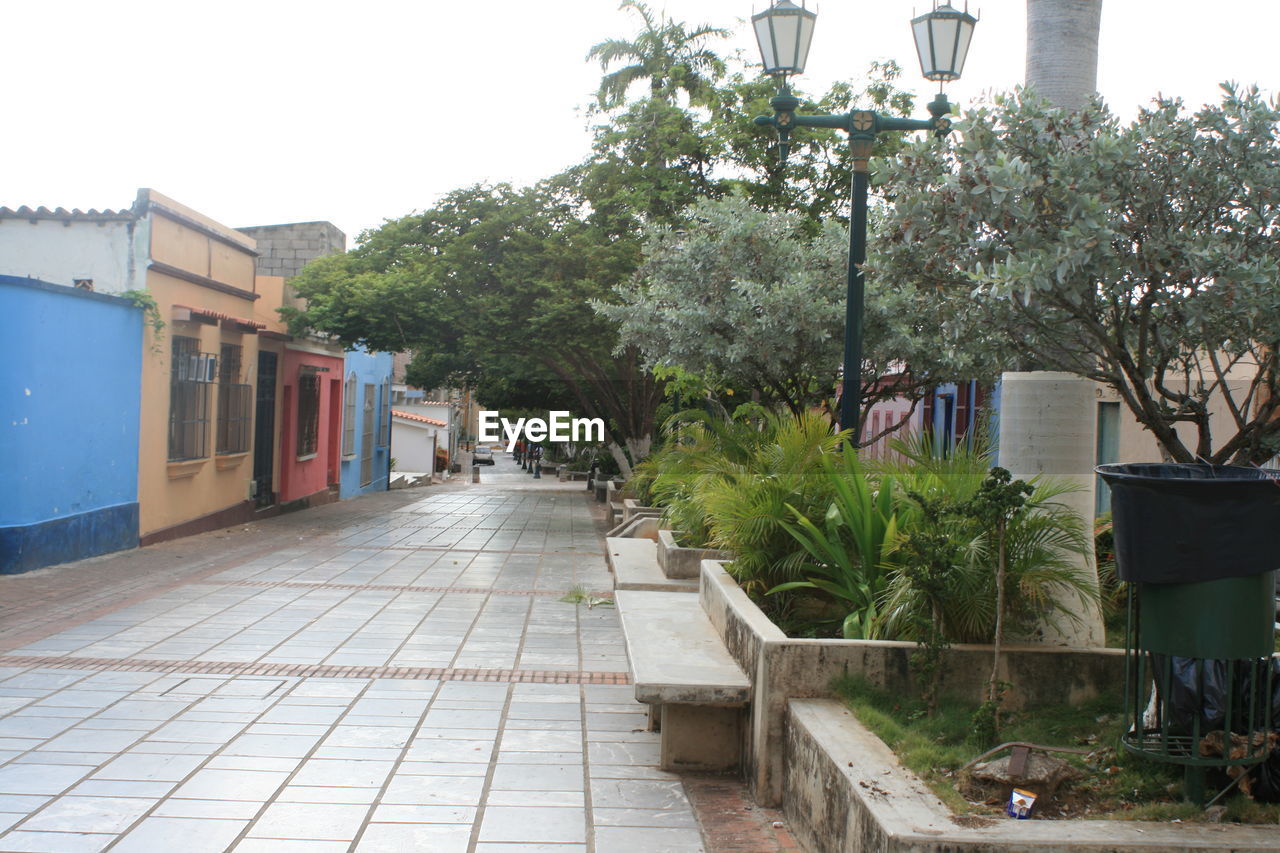 Street amidst houses in town