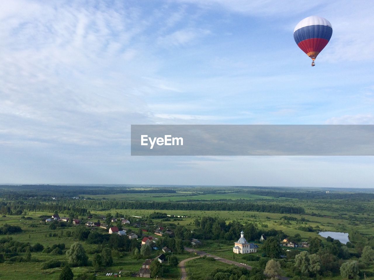 SCENIC VIEW OF HOT AIR BALLOON AGAINST SKY