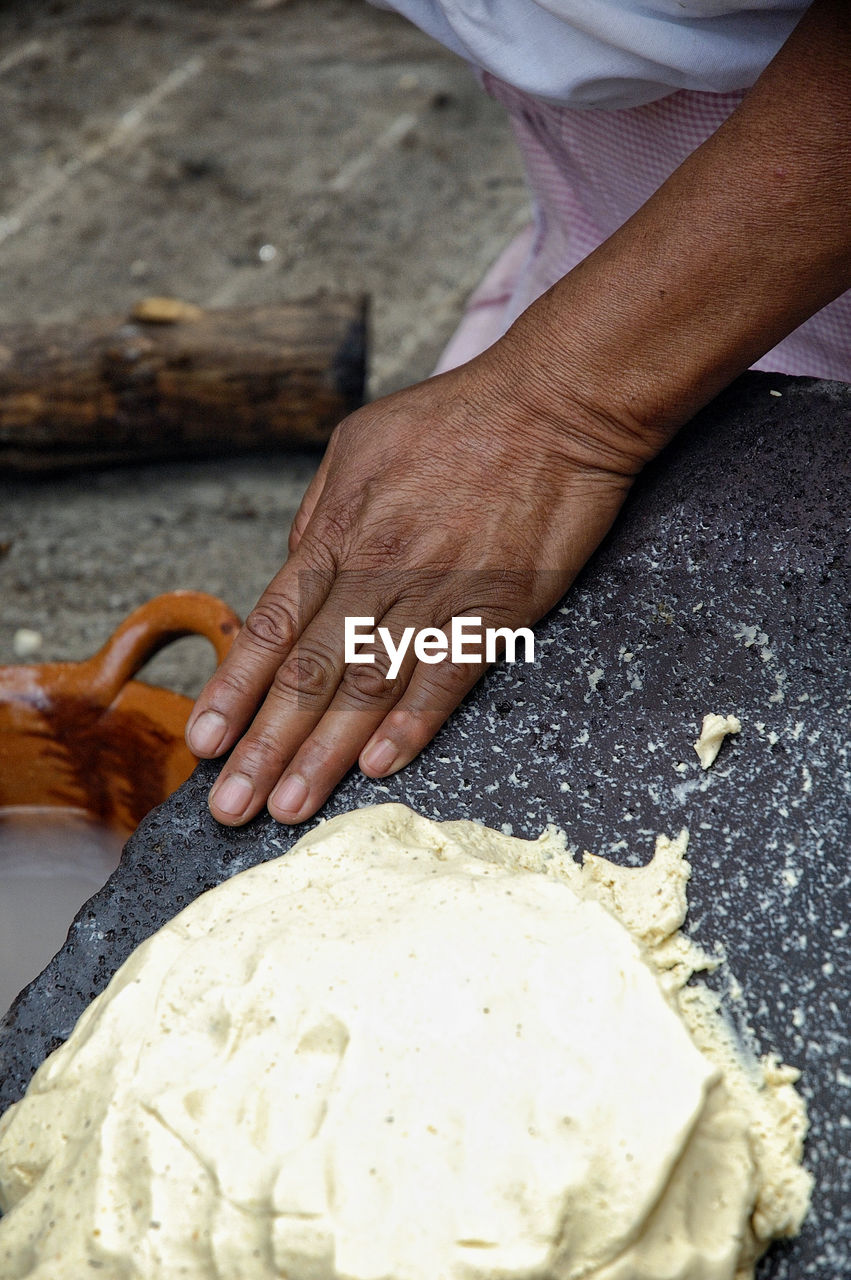 High angle view of man preparing food