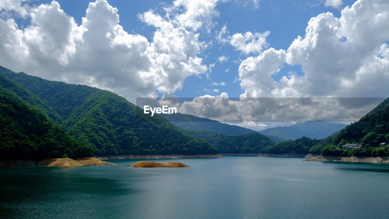 Okutama lake against mountains in summer