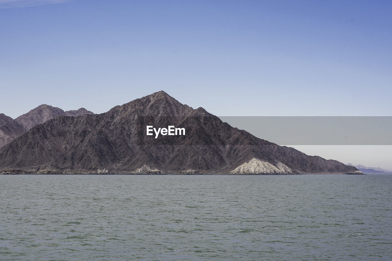 Scenic view of mountains against clear sky