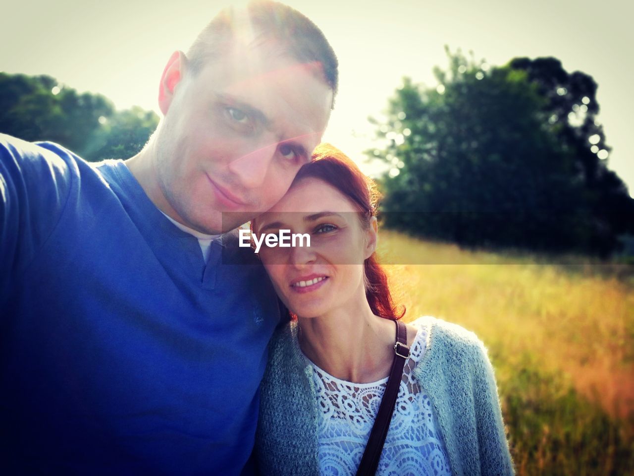 Portrait of couple against plants