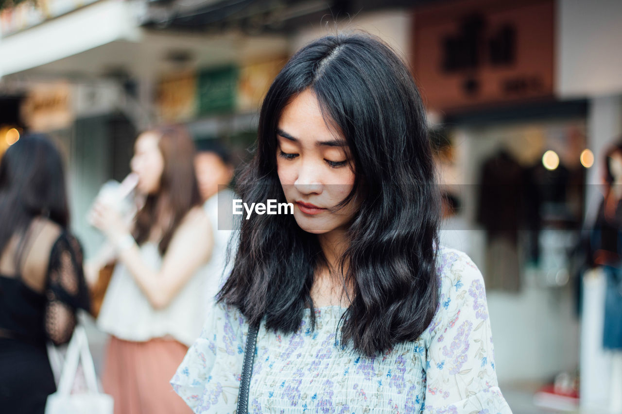 Young woman looking away