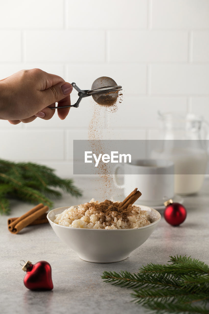 cropped hand of person preparing food