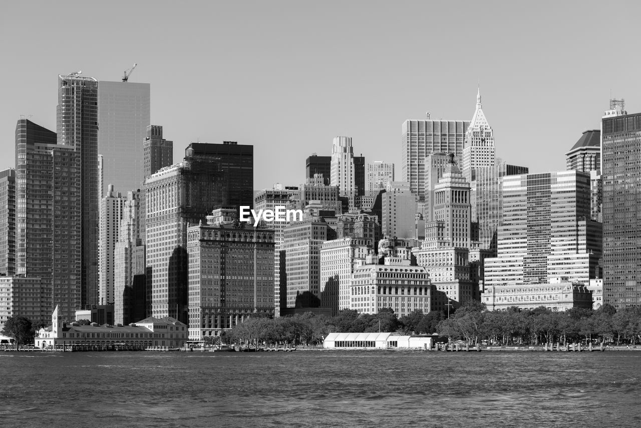 Modern buildings in city against sky