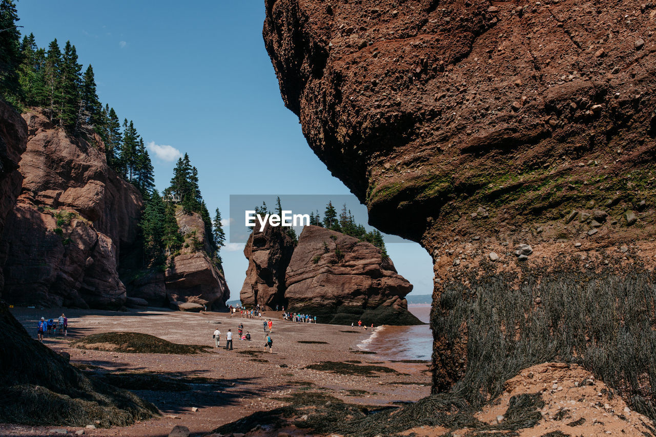 Scenic view of rock formations on beach