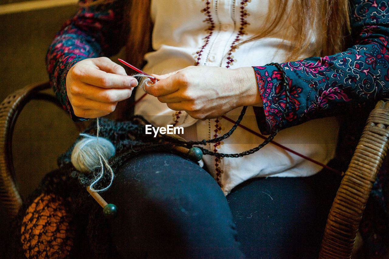 Close-up of woman knitting