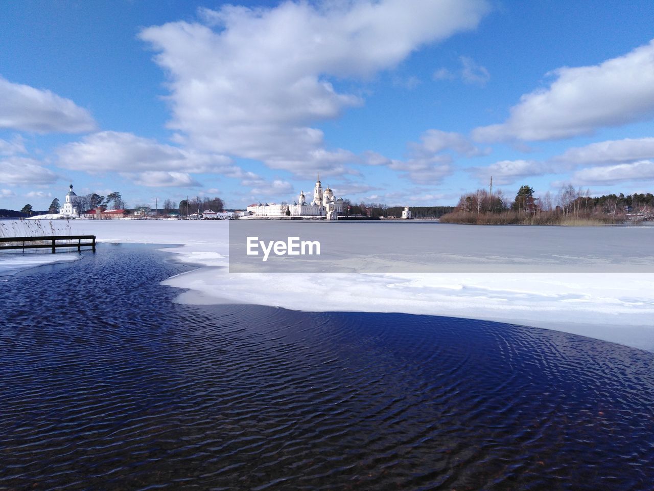 Scenic view of sea against sky during winter