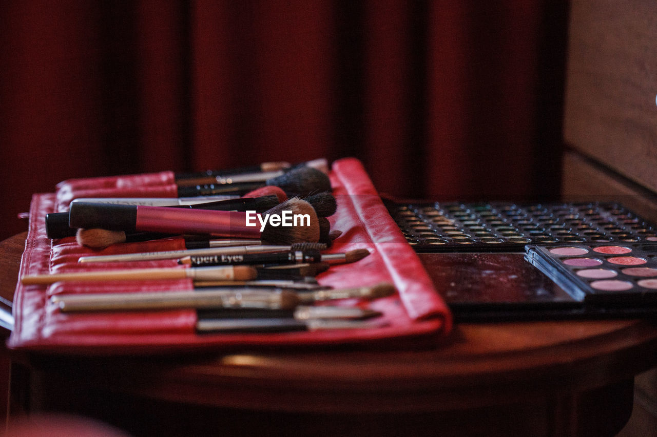 Close-up of beauty products on table