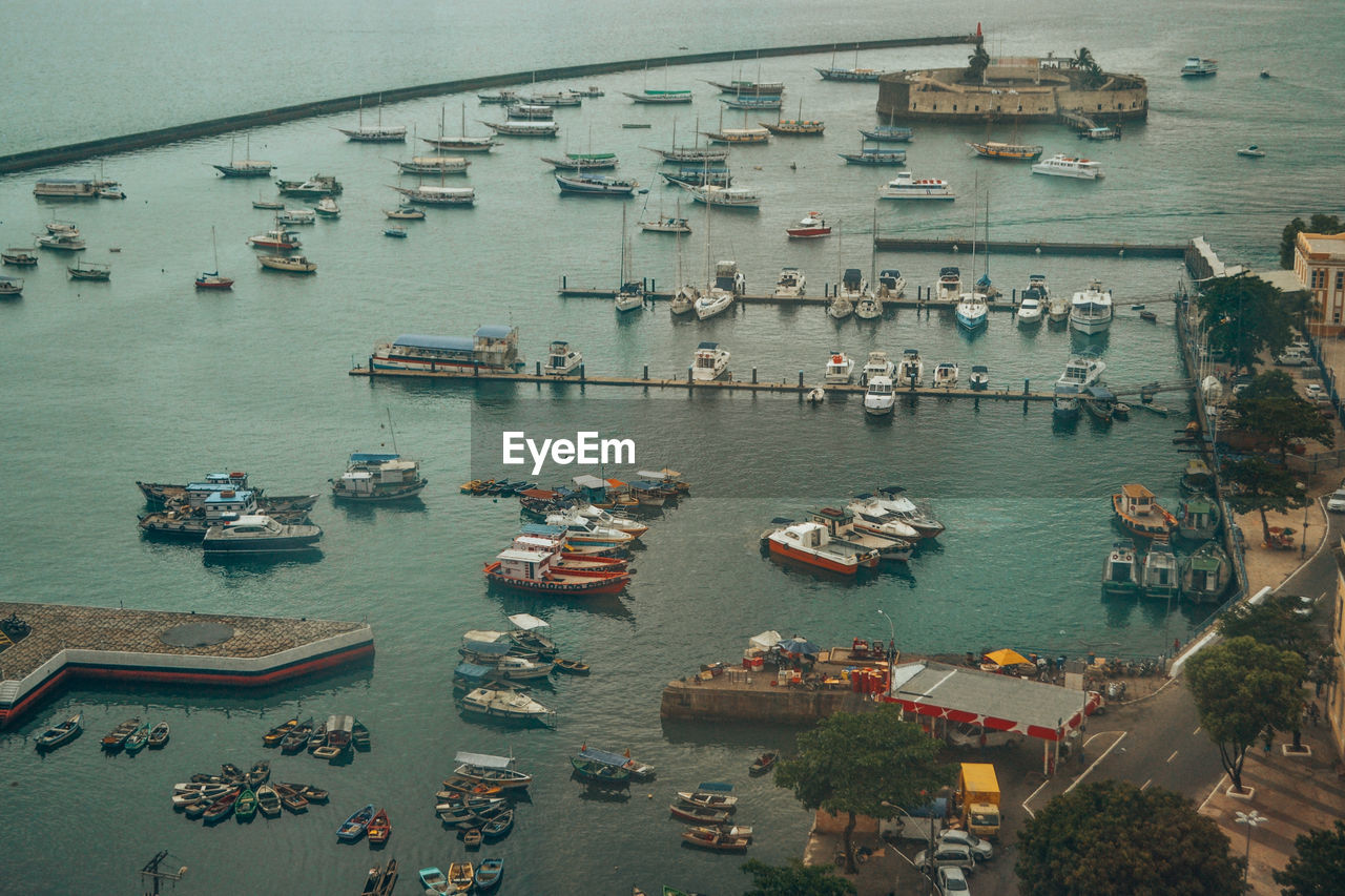 Aerial view of boats sailing at harbor