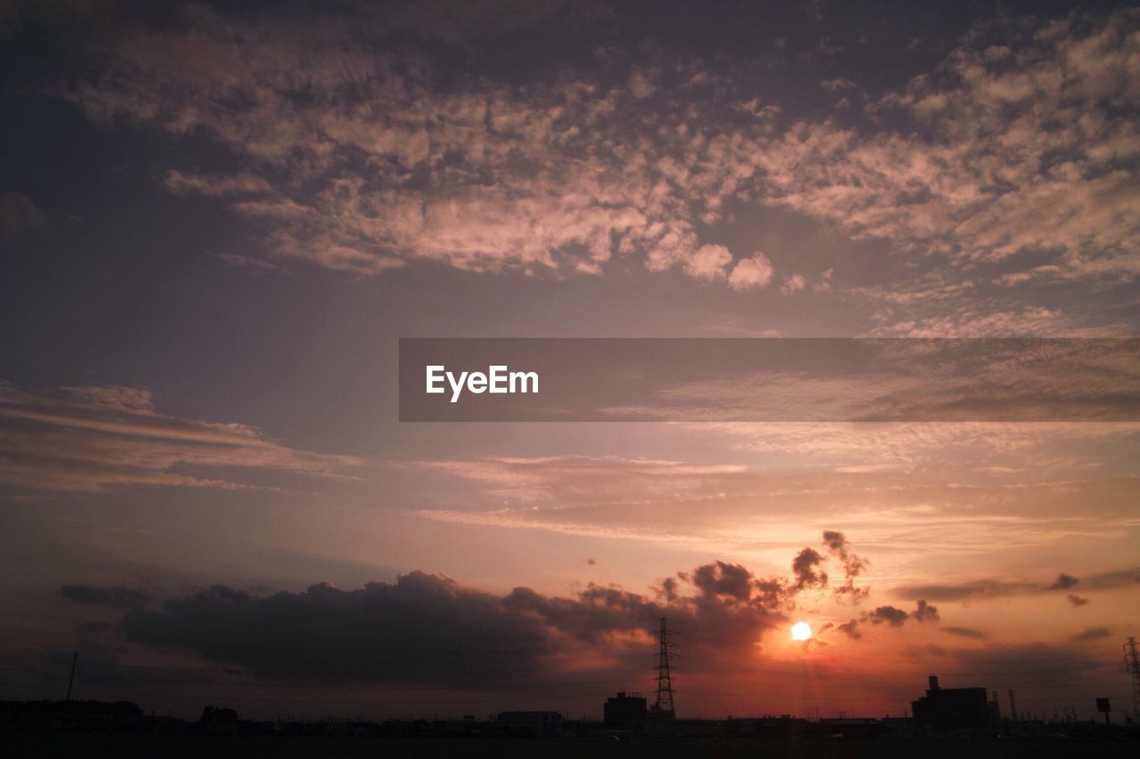 SILHOUETTE OF LANDSCAPE AT SUNSET