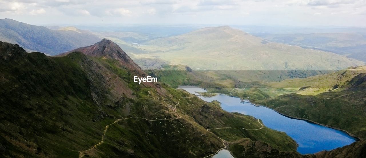 High angle view of lake amidst mountains