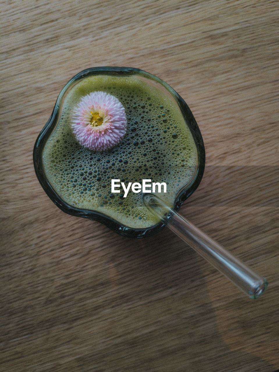 food and drink, food, table, green, healthy eating, wellbeing, indoors, high angle view, freshness, leaf, wood, no people, drink, directly above, produce, flower, still life, refreshment, plant, kitchen utensil, close-up, fruit, spoon, household equipment