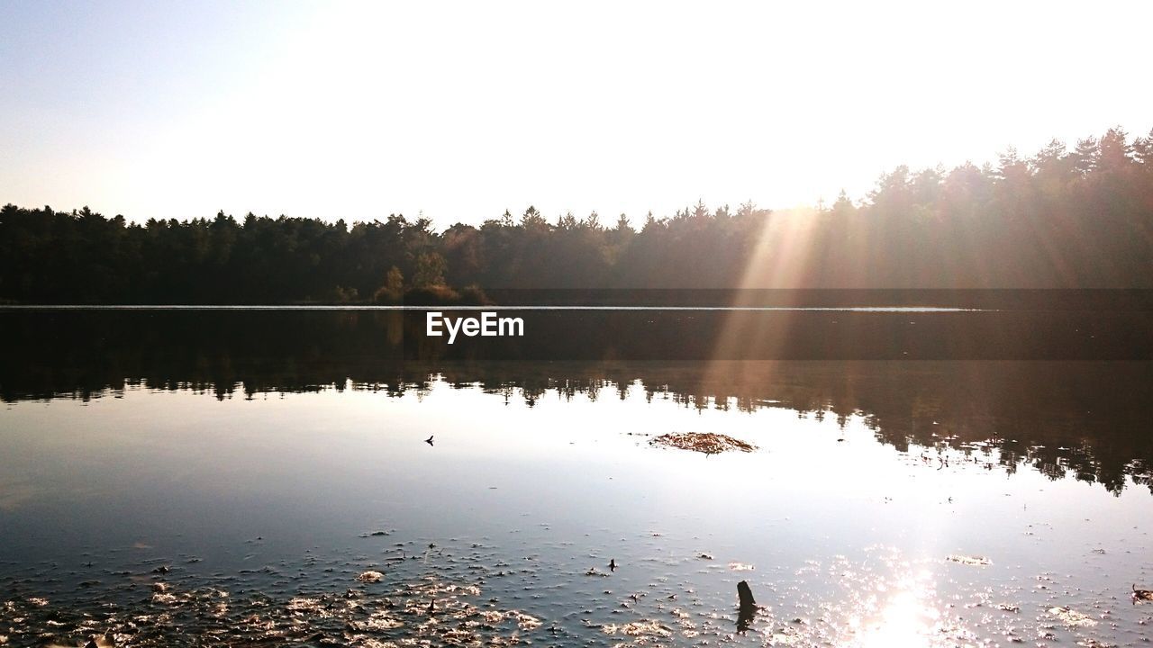 Idyllic view of calm lake against sky