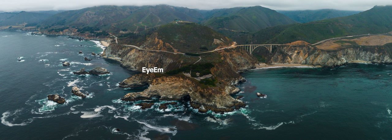 high angle view of sea and mountains