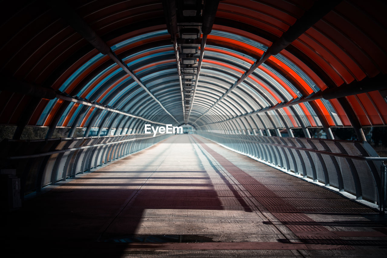 LOW ANGLE VIEW OF AN EMPTY TUNNEL