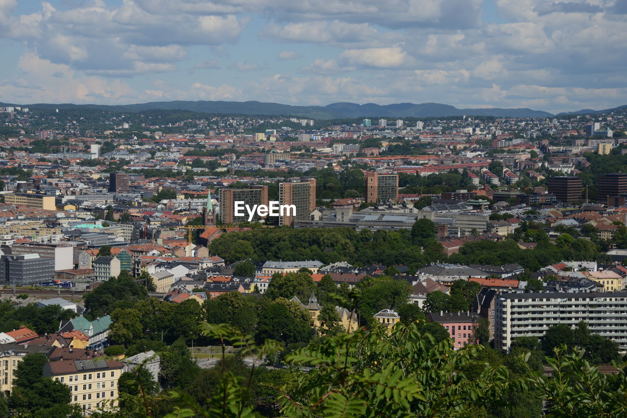 High angle shot of townscape against sky