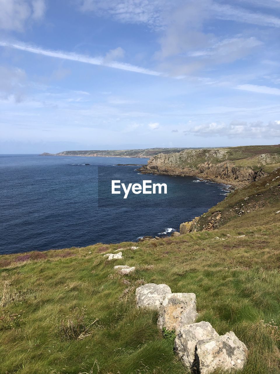 SCENIC VIEW OF SEA AND BEACH AGAINST SKY