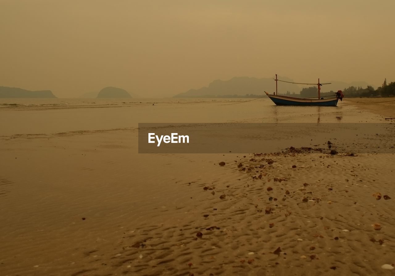 BOAT ON THE BEACH