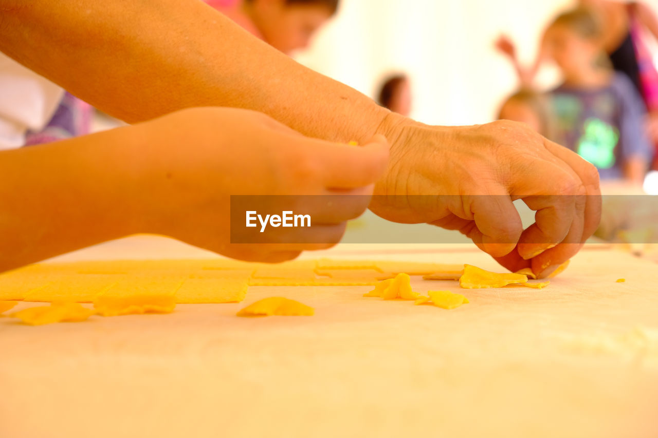 Close-up of person preparing food