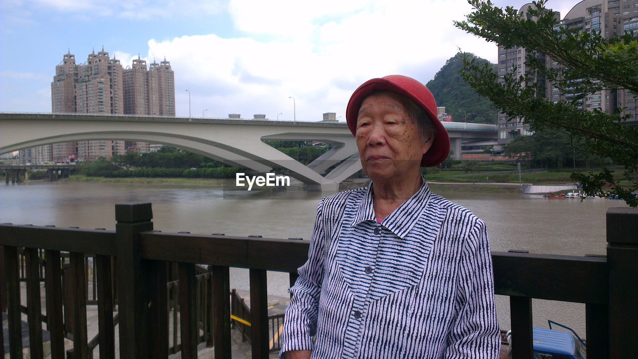 Senior woman on bridge