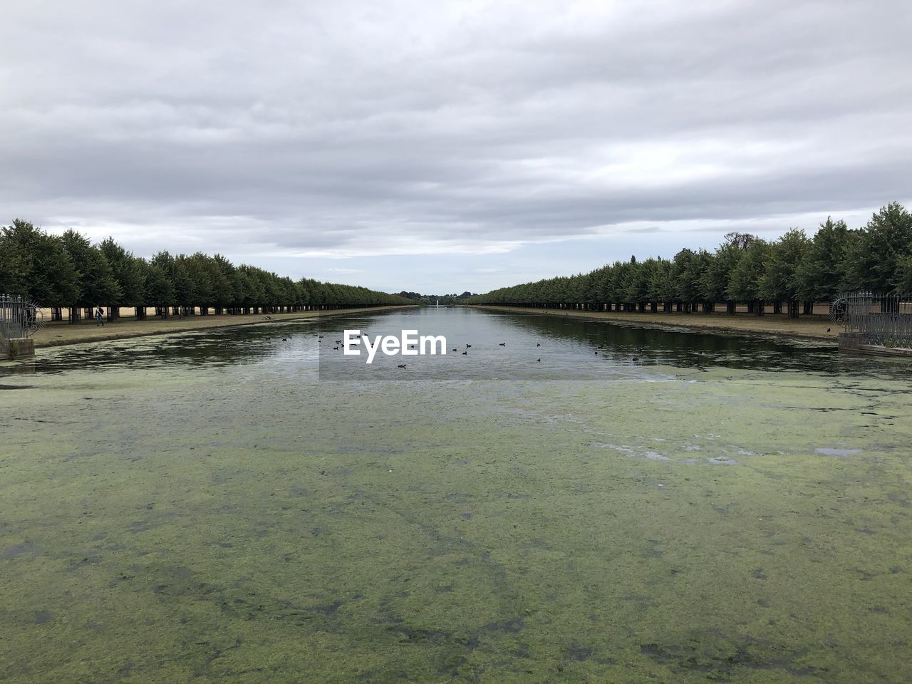 PANORAMIC VIEW OF LAKE AGAINST SKY
