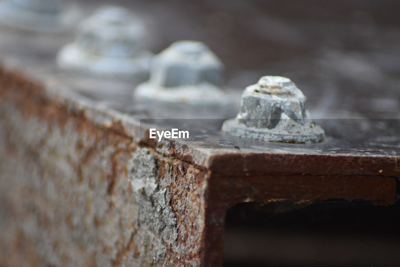 CLOSE-UP VIEW OF RUSTY PIPE