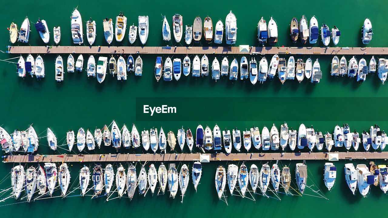 Aerial view of boats moored at harbor