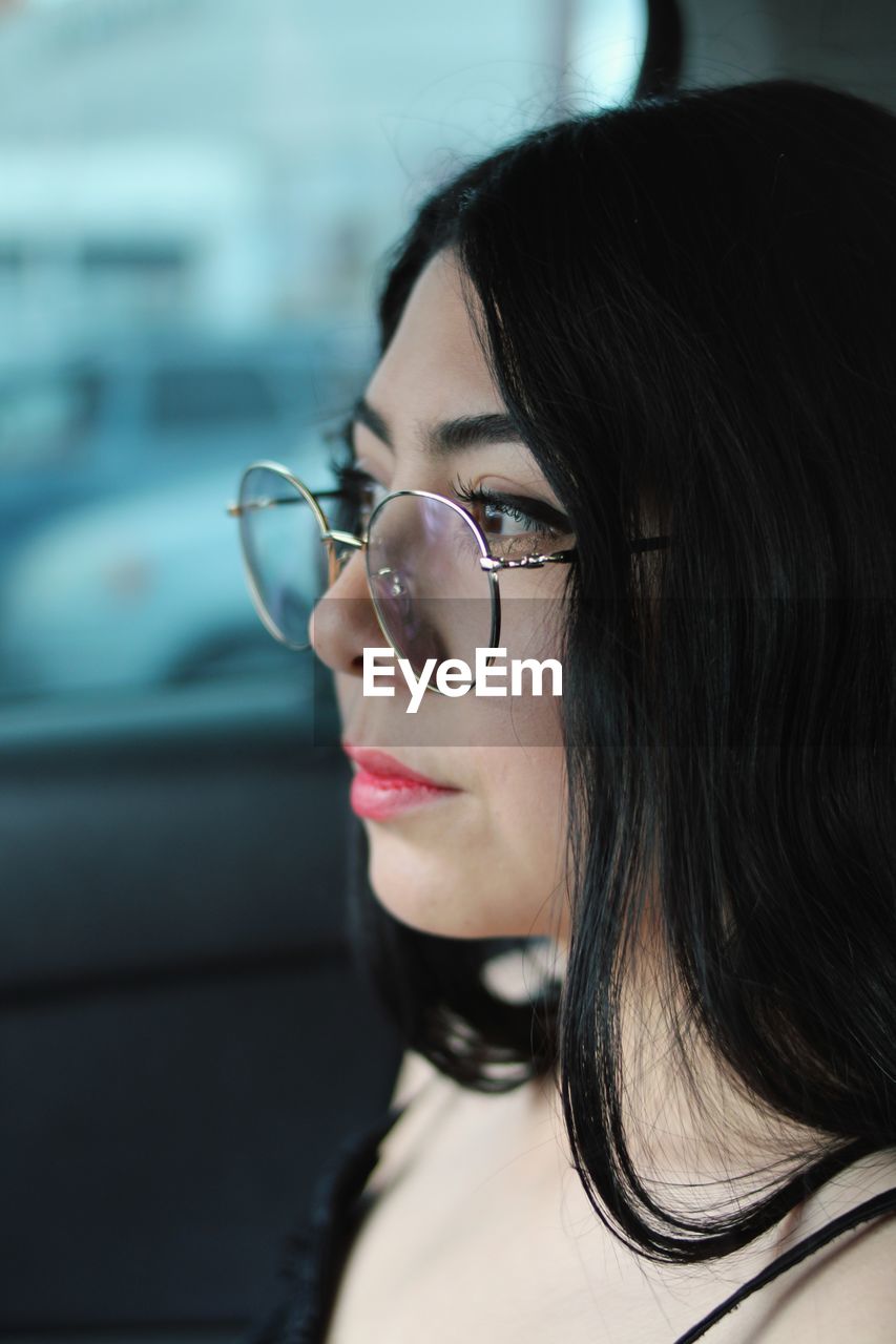 Portrait of woman wearing sunglasses