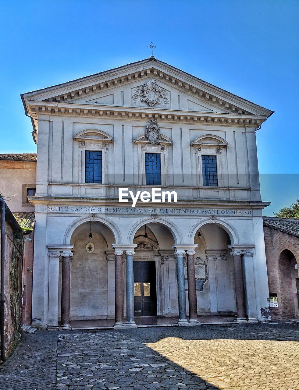 Low angle view of church against clear blue sky