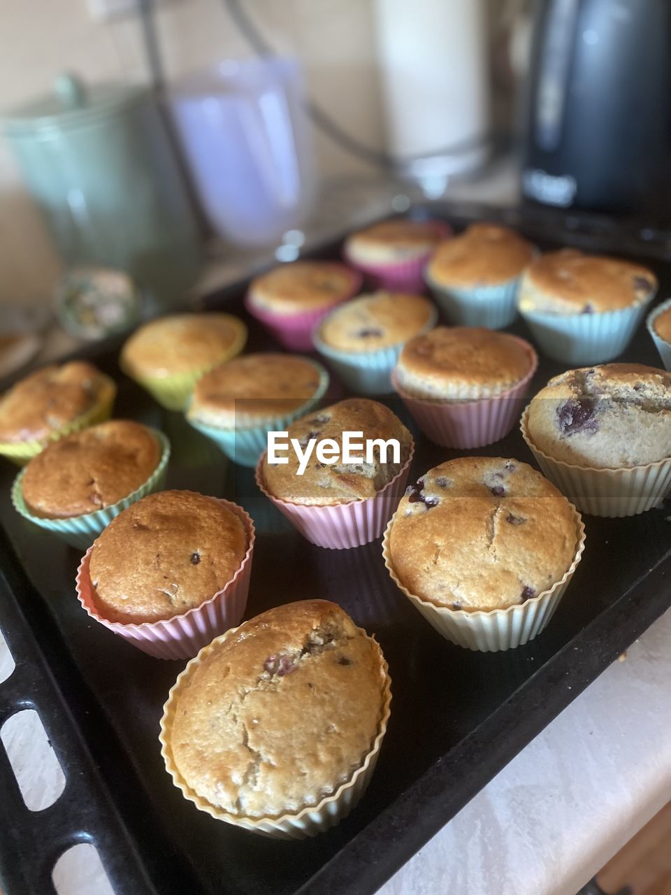 food and drink, food, baked, muffin, dessert, sweet food, freshness, sweet, cake, indoors, no people, produce, meal, store, breakfast, cooking, cupcake, baking sheet, sweetness, bakery, still life, high angle view, icing