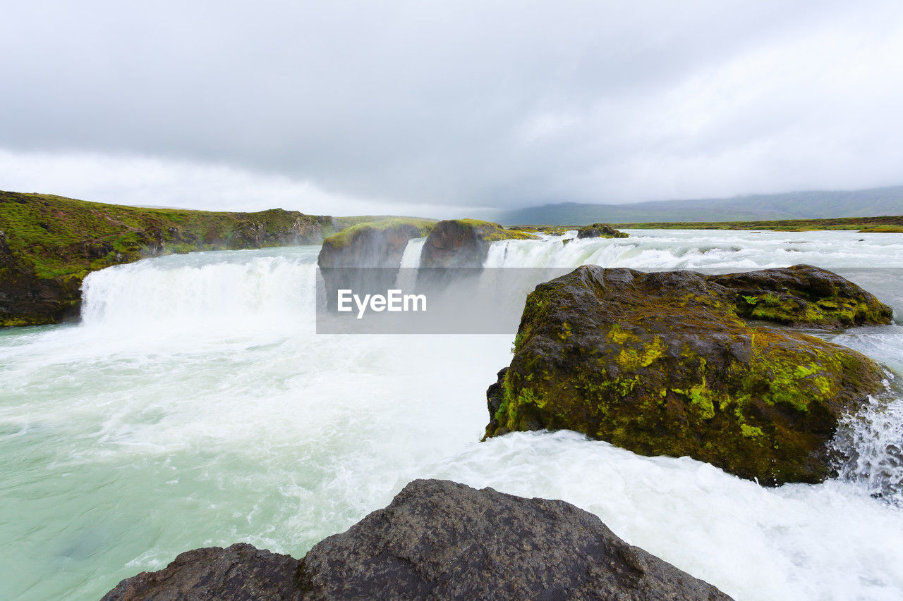 water, scenics - nature, beauty in nature, environment, body of water, coast, waterfall, nature, rock, landscape, sea, land, sky, cloud, motion, travel destinations, shore, travel, ocean, wave, tourism, fog, outdoors, no people, cliff, water feature, wind wave, power in nature, long exposure, terrain, non-urban scene, cold temperature, sports, flowing, social issues, overcast, wet, holiday, trip, flowing water, plant, environmental conservation, mountain, vacation, idyllic, rock formation, adventure