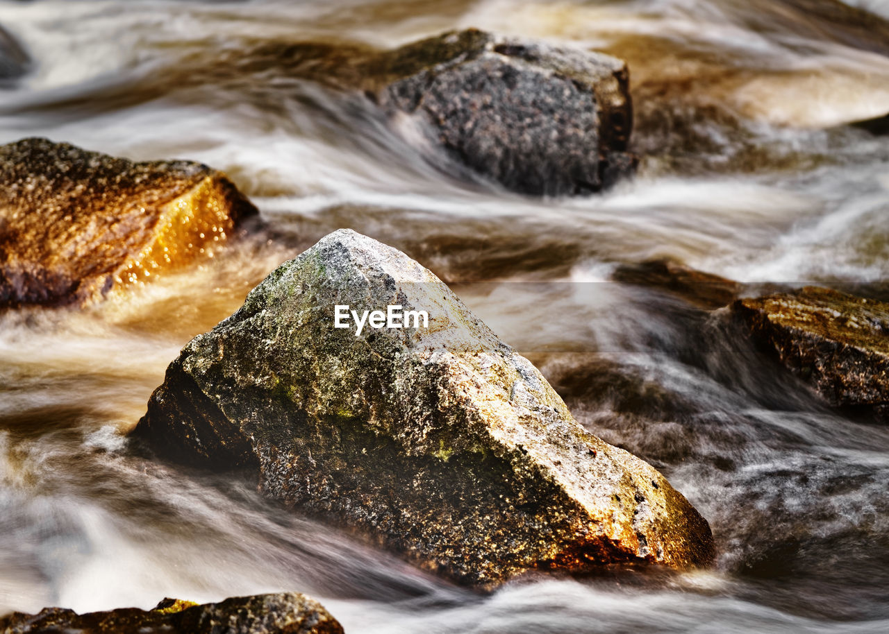 Close-up of rocks at beach