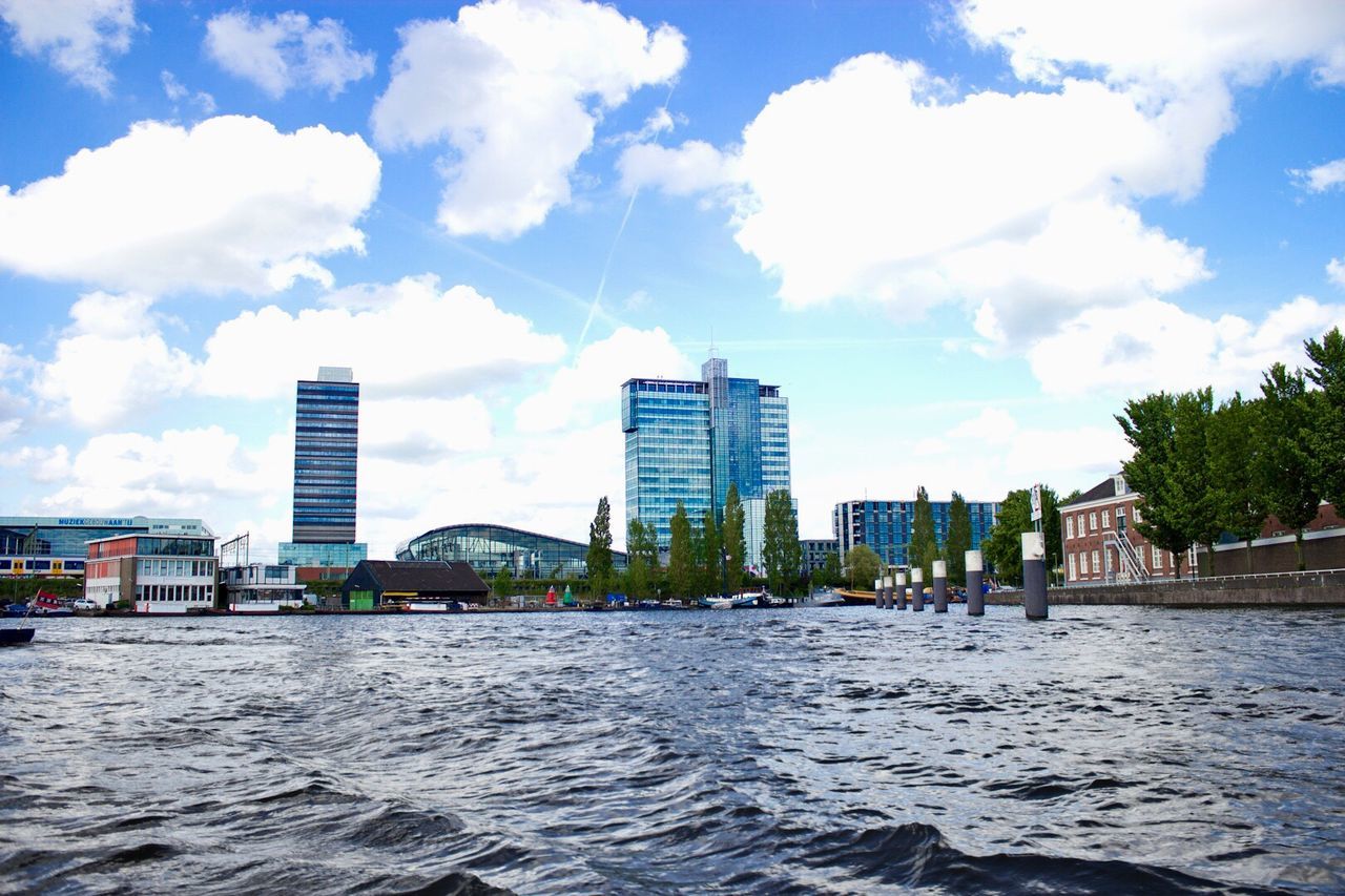 Buildings in city against sky